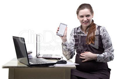 Angry pregnant woman with smartphone