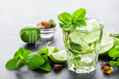 Mojito Cubano or caipirinha cocktail, iced drink with lime and mint