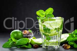 Mojito Cubano or caipirinha cocktail, iced drink with lime and mint