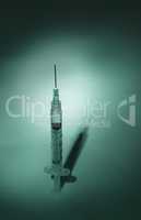 Long hypodermic needle ready for injection