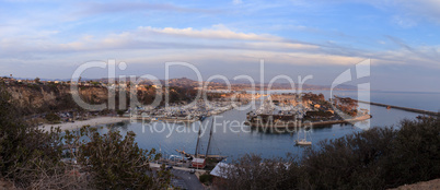 Panoramic Dana Point harbor view of the sunset