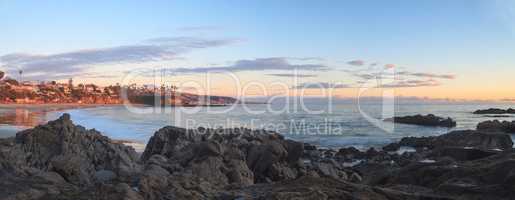 Crescent Bay beach panoramic view of the ocean at sunset