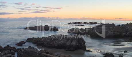 Crescent Bay beach panoramic view of the ocean at sunset