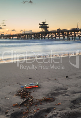 Bottle of alcohol on the beach