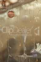 Clear Christmas ornament with lights and champagne glass