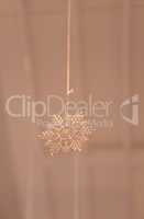 Gold and silver Christmas snowflake ornament