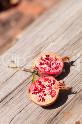 Fresh red organic pomegranate fruit Punica granatum grown