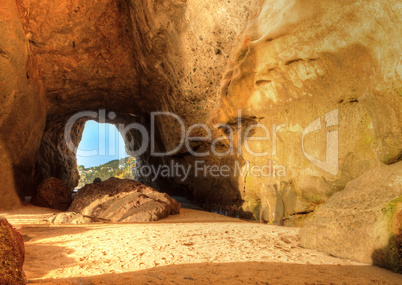 Opening of a cave at One Thousand Steps Beach