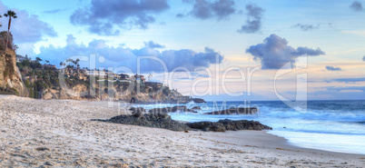 Sunset over the coastline of One Thousand Steps Beach