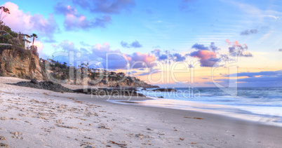 Sunset over the coastline of One Thousand Steps Beach