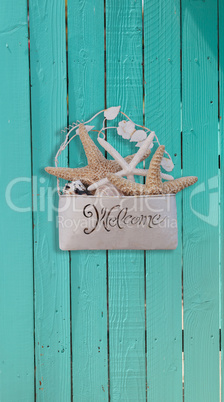 Starfish and seashell welcome basket decor