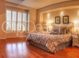 Large master bedroom with recessed lighting