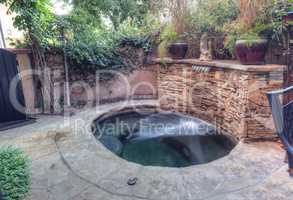 Oval hot tub spa with waterfall