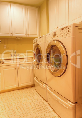 Small laundry room with washer, dryer