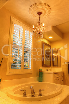 Oval hot tub spa bathtub in a marble bathroom