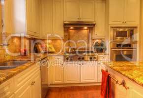Large gourmet kitchen with recessed lighting