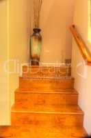 Hardwood stairs with recessed lighting