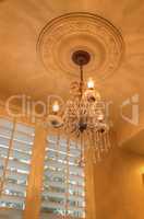 chandelier with crown molding.