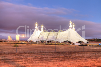 Full moon over a circus tent