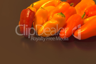 Red, yellow, orange colorful healthy organic peppers