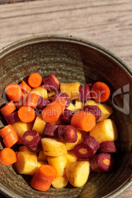 Chopped colorful red, yellow and orange organic carrots