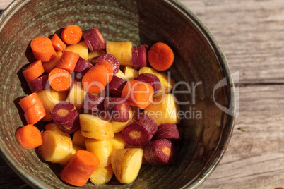 Chopped colorful red, yellow and orange organic carrots