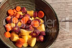 Chopped colorful red, yellow and orange organic carrots