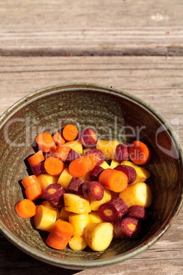 Chopped colorful red, yellow and orange organic carrots