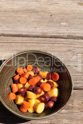 Chopped colorful red, yellow and orange organic carrots