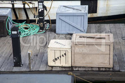 Crates on the deck of a wooden boardwalk
