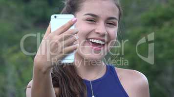 Teen Girl Taking Selfy With Cell Phone
