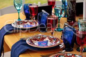 Red and royal blue table setting