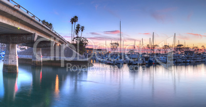 Sunset over boats at Dana Point Harbor