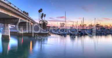 Sunset over boats at Dana Point Harbor