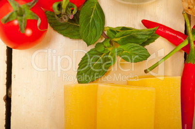 Italian pasta paccheri with tomato mint and chili pepper