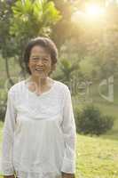 Asian seniors woman smiling at outdoor