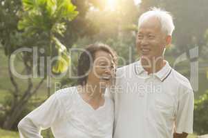 Asian seniors couple at outdoor park