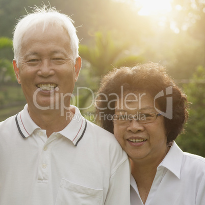 Loving Asian seniors couple