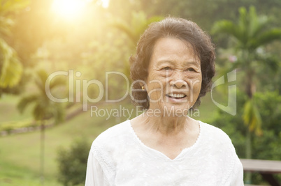 Happy Asian seniors woman laughing at outdoor