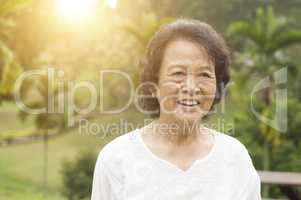 Happy Asian seniors woman laughing at outdoor