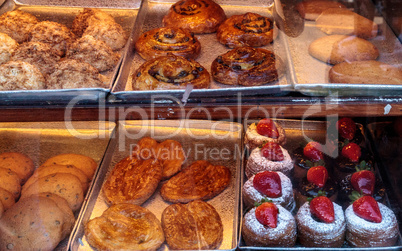Sweet pastries in a bakery window