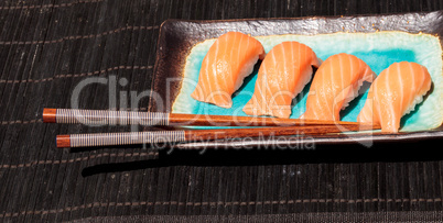 salmon sushi on white rice