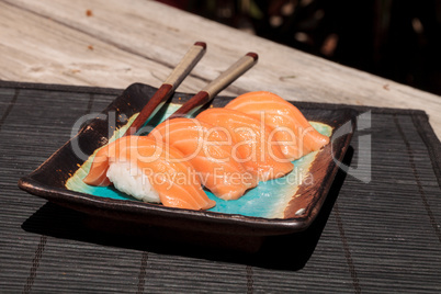 salmon sushi on white rice