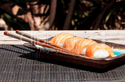 salmon sushi on white rice