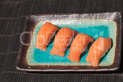 salmon sushi on white rice