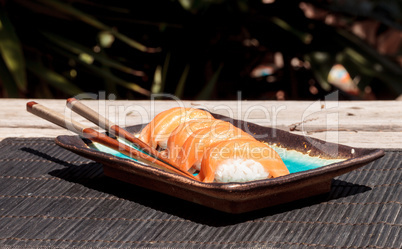 salmon sushi on white rice