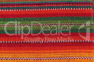 Macro of textured colorful fabric