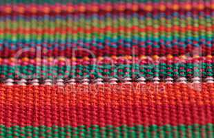 Macro of textured colorful fabric