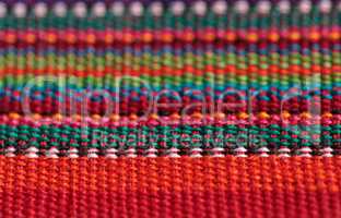 Macro of textured colorful fabric