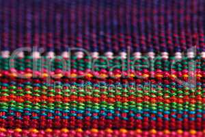 Macro of textured colorful fabric